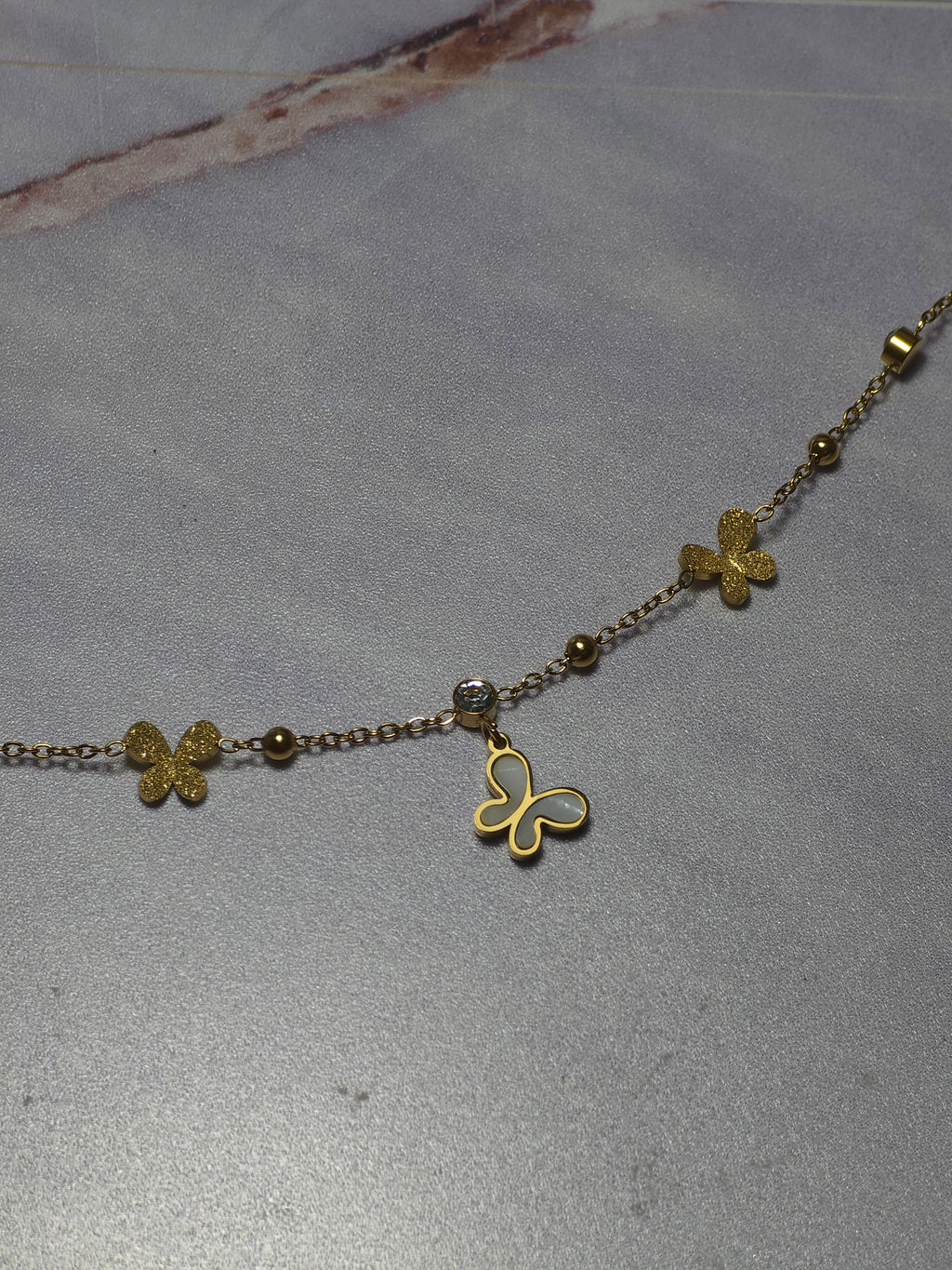Chaîne de cheville Papillon
